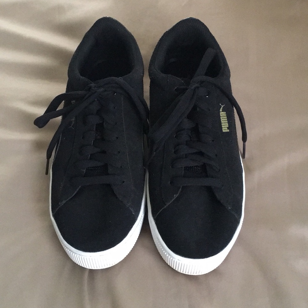 Black Puma sneakers